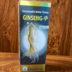 Front of a homeopathic Ginseng tincture box with ginseng root illustration on a wooden surface, includes a Sugar Free label and UNISON branding at the bottom