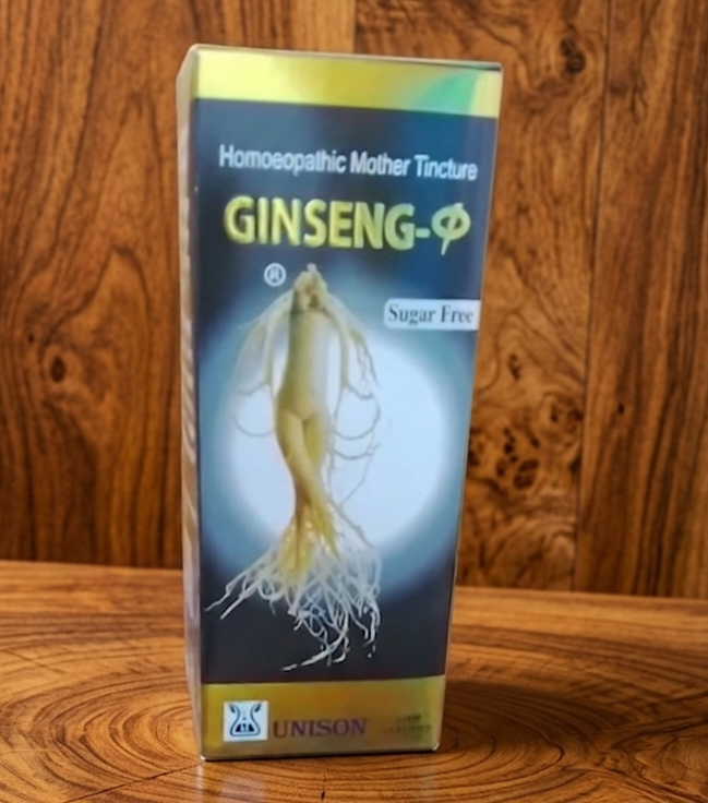 Front of a homeopathic Ginseng tincture box with ginseng root illustration on a wooden surface, includes a Sugar Free label and UNISON branding at the bottom